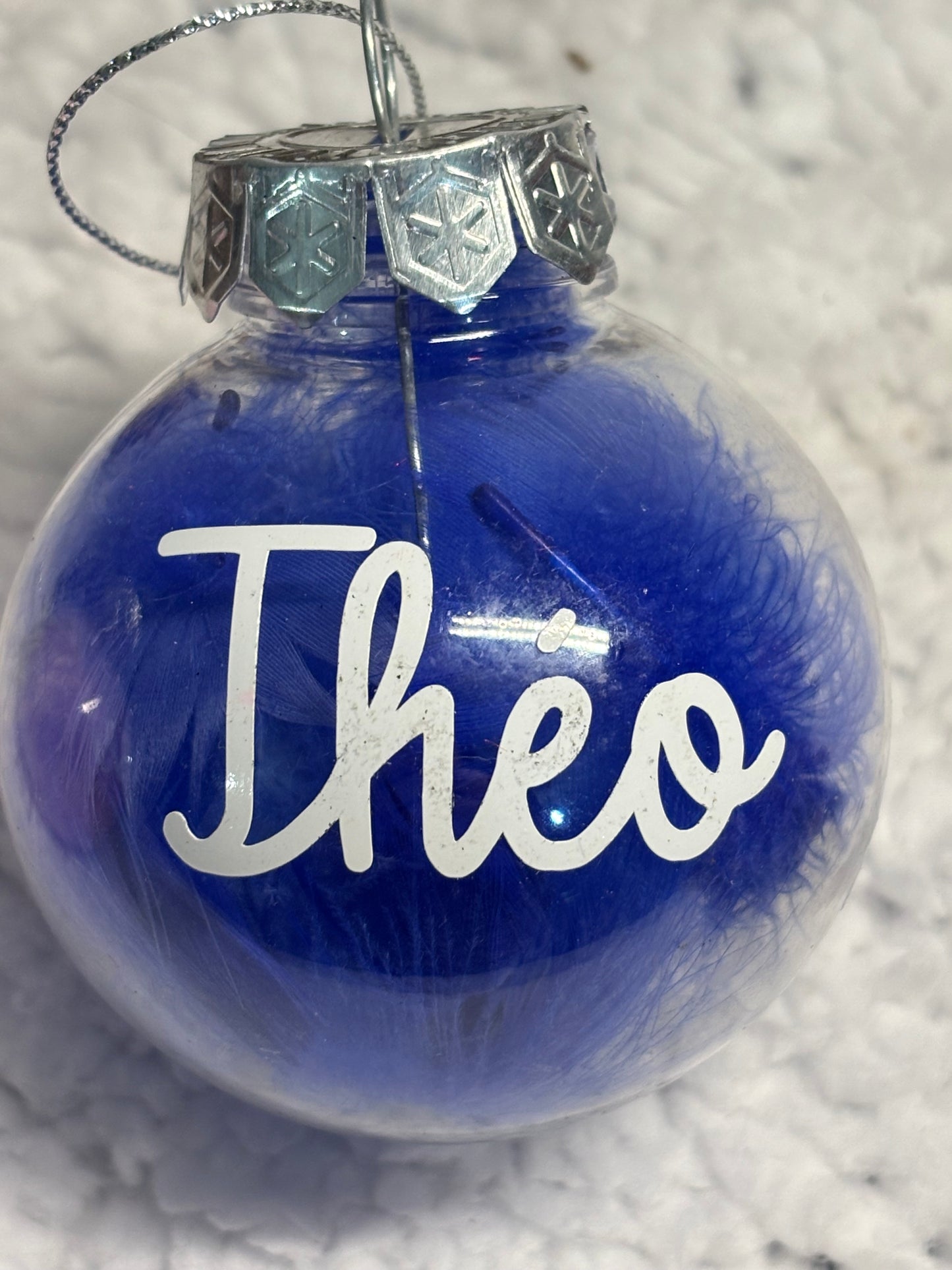 Boule Noël transparente plumes personnalisée