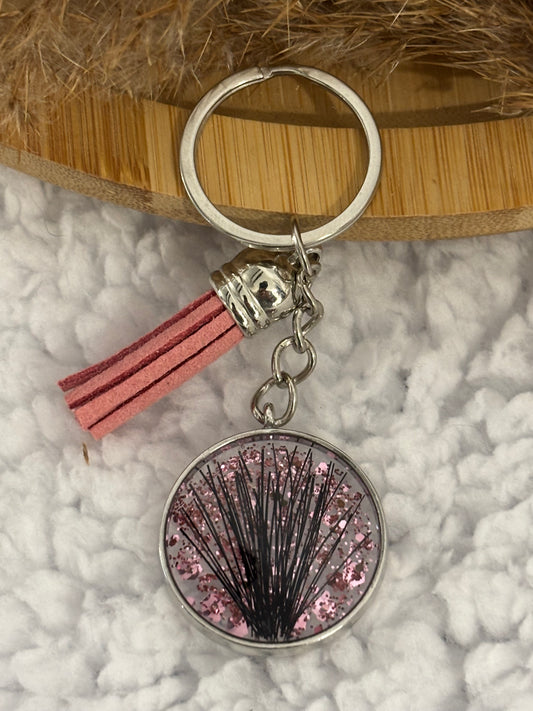 Porte clés pompon argent